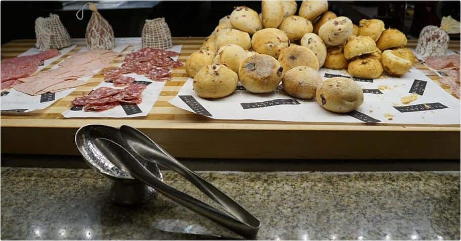 bread and salami at a buffet