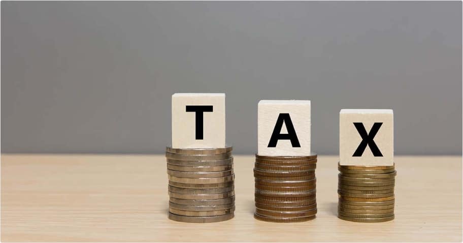 Tax signs and coins